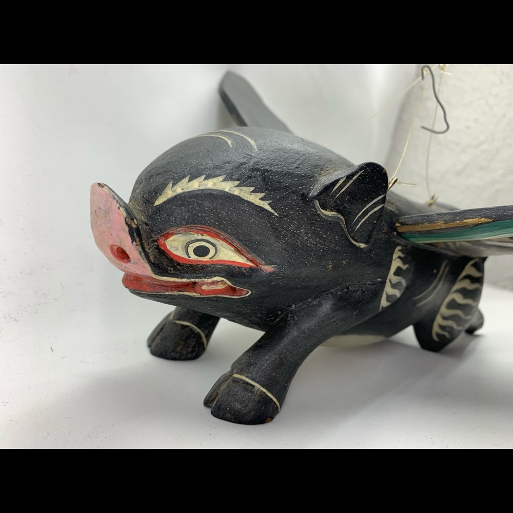 Hand carved flying pig
